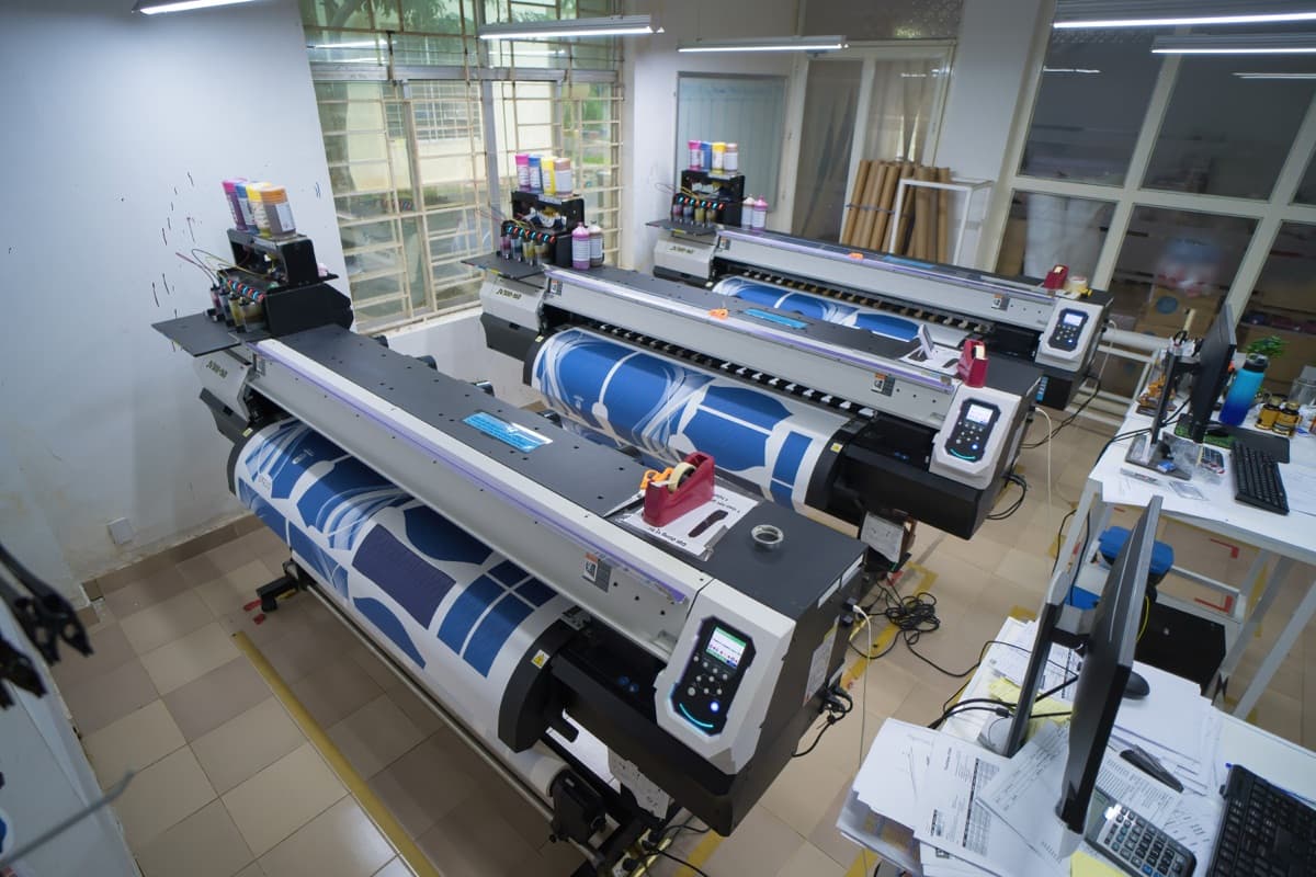 Large format printing production floor with industrial printers